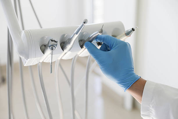 Professional Tooth Extraction technician working in Hartford, MI